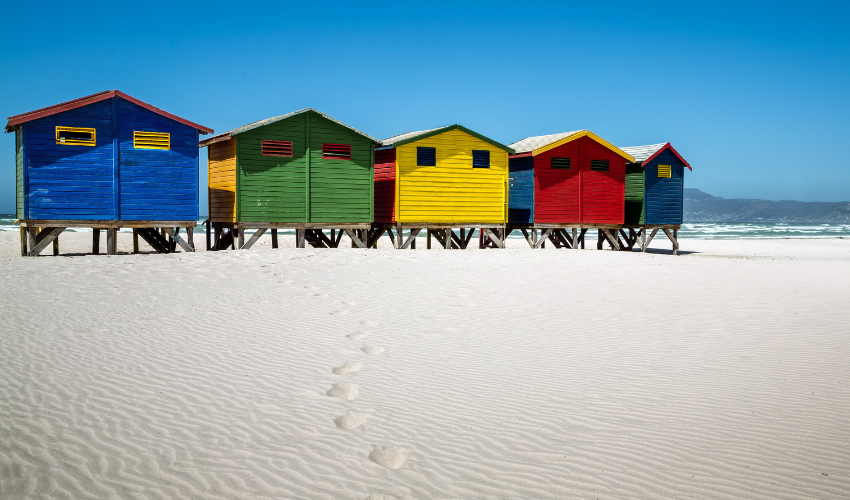 Stretch of colourful beach huts on Muizenberg Beach